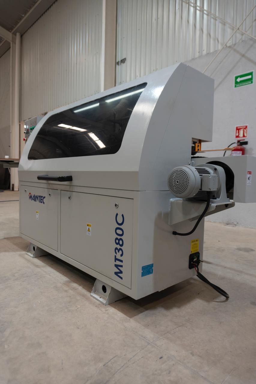 ENCHAMPADORA  AUTOMATICA CANTEADORA MANERAL CON MEDIOR ANALOGICO TRES ESTACIONES ENCOLADO RECORTE ASPERO Y FINO PULIDO DE PERFILVOLTAJE DE ALIMENTACION TRIFASICO